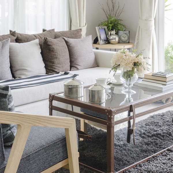 flower in glass vase on table in living room at home