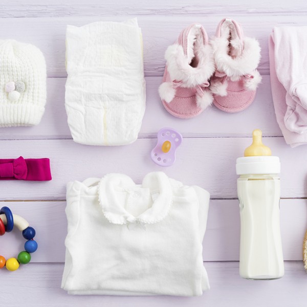 Collection of items for babies shot from above. Ideal website hero or header image