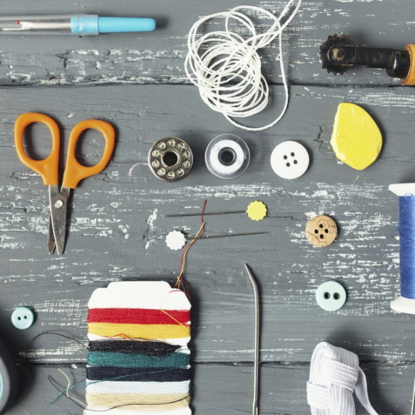 Background with sewing and knitting tools and accesories